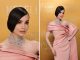 Sofia Carson and Millie Bobby Brown wear Chopard to the 31st SAG Awards in Los Angeles